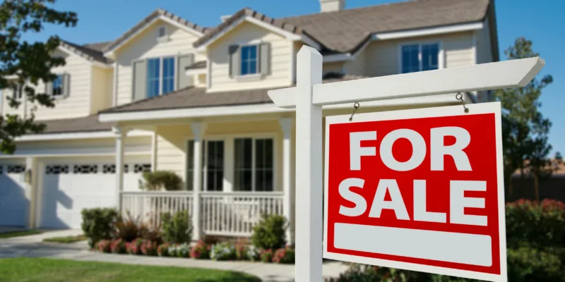 For Sale sign on residential home