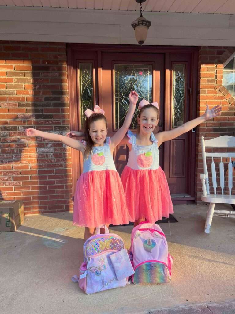 Girls on first day of school celebrating inheritance